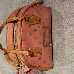 Dooney & Bourke Vintage Pink With Heart Charm.